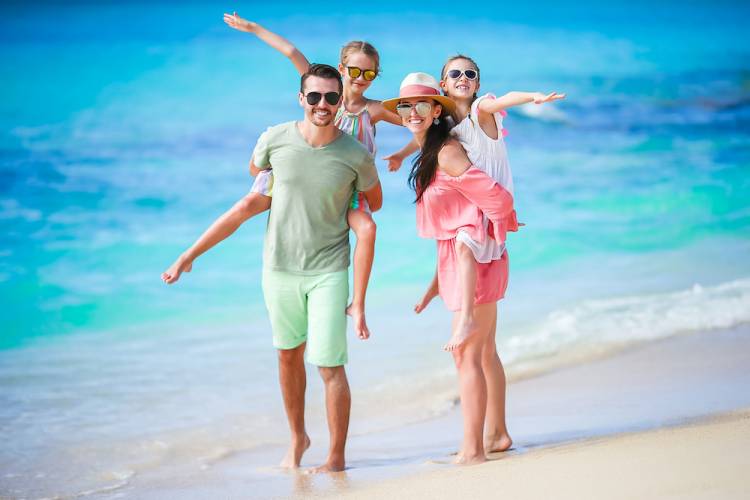 family walking on beach