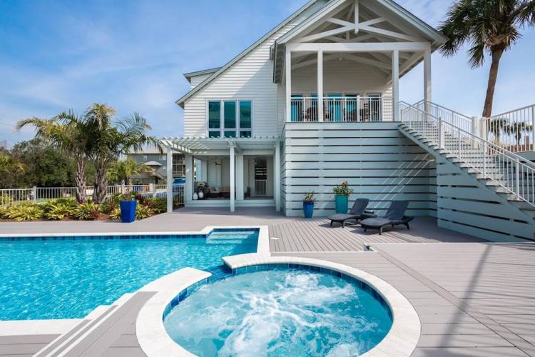 view of vacation rental with pool and hot tub in 30A